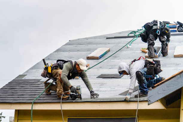 Professional Roofing technician working in Manson, NC